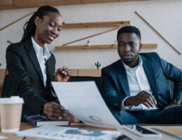 Black business woman in office meeting