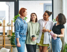 women friends in an office